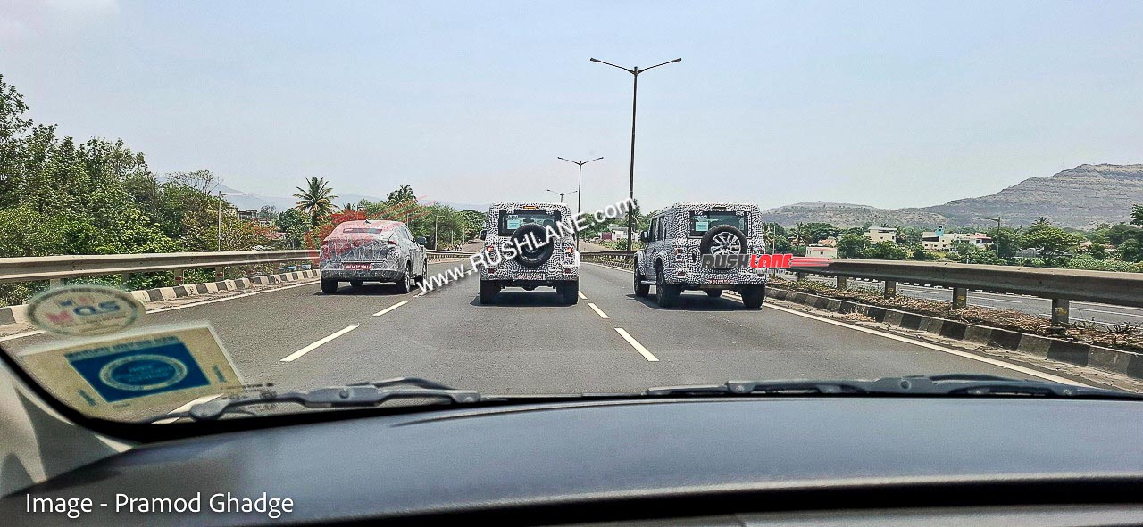 Mahindra Thar Armada And Tata Curvv Spied from a Maruti car